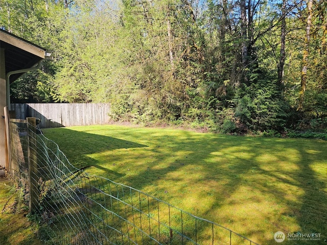 view of yard with fence