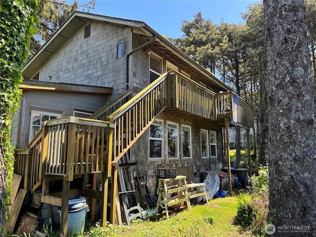 4751 State Route 109, Moclips, WA 98562 - rear view of house with stairs and a wooden deck