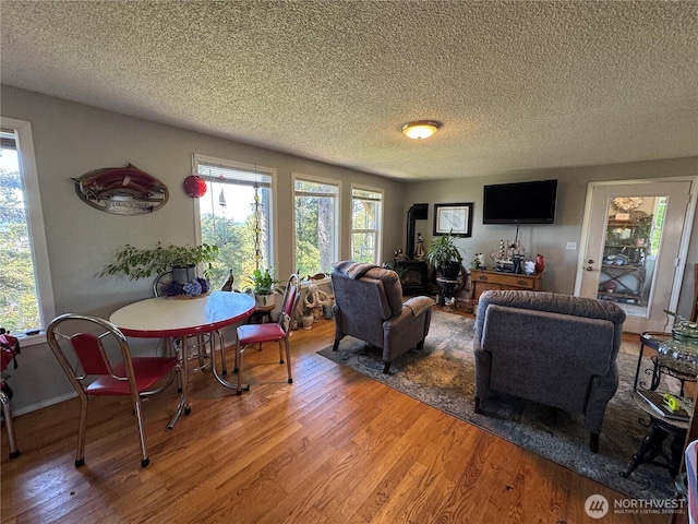 4751 State Route 109, Moclips, WA 98562 - living room featuring wood finished floors and a textured ceiling