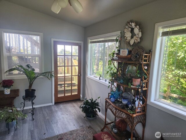 4751 State Route 109, Moclips, WA 98562 - doorway to outside featuring vaulted ceiling, wood finished floors, baseboards, and a ceiling fan