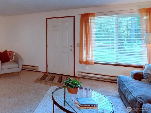 living area with carpet floors, a baseboard radiator, and plenty of natural light