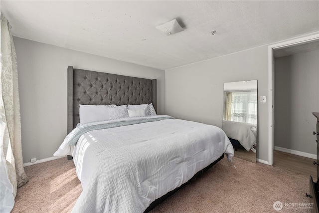 bedroom featuring baseboards