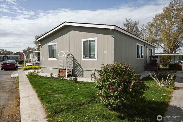 49 Compton Ln, Richland, WA 99354 - exterior space with a front lawn
