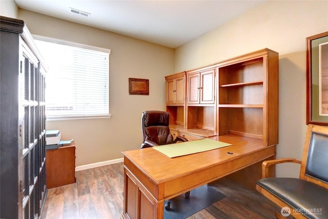 office area featuring wood finished floors and baseboards