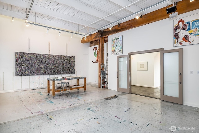 garage featuring baseboards