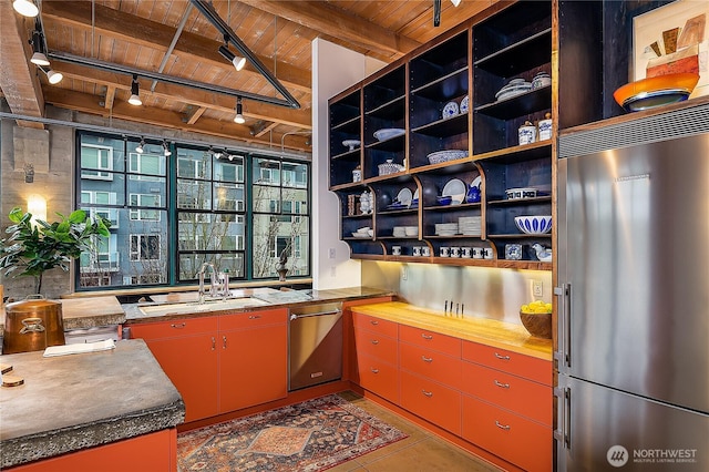 kitchen featuring open shelves, wooden ceiling, a sink, stainless steel appliances, and red cabinetry