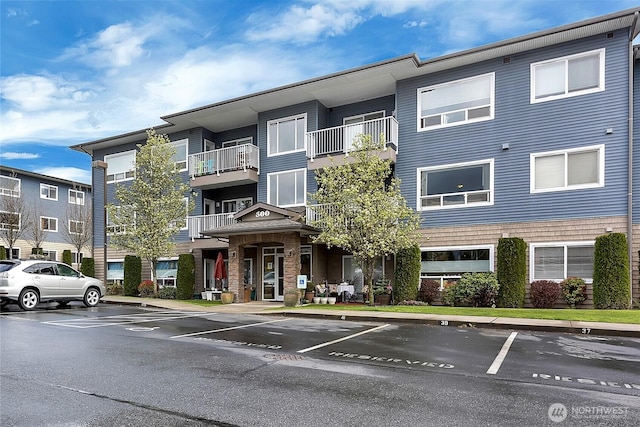 500 Darby Dr Unit A-304, Bellingham, WA 98226 - view of building exterior featuring uncovered parking