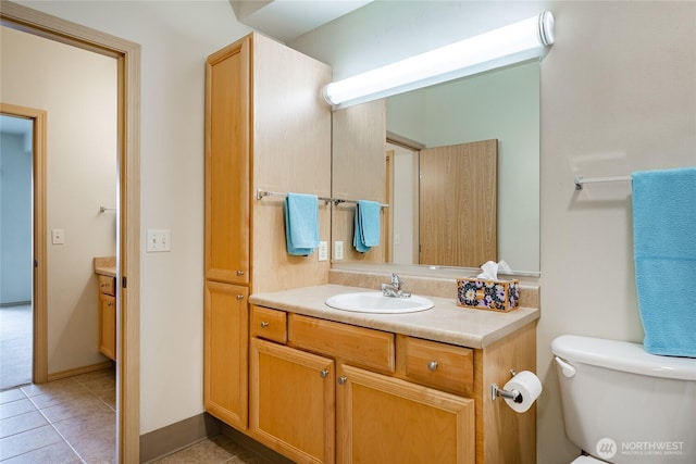 500 Darby Dr Unit A-304, Bellingham, WA 98226 - bathroom featuring toilet, vanity, and tile patterned flooring