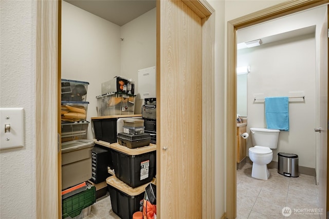 500 Darby Dr Unit A-304, Bellingham, WA 98226 - interior space featuring tile patterned floors, baseboards, and toilet