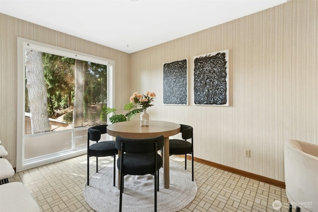 9376 Mercerwood Dr, Mercer Island, WA 98040 - dining space with baseboards, wallpapered walls, and brick patterned floor