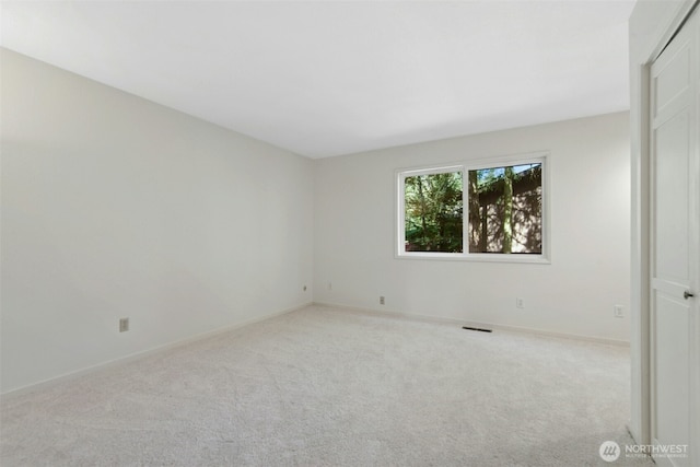 9376 Mercerwood Dr, Mercer Island, WA 98040 - carpeted empty room with baseboards and visible vents