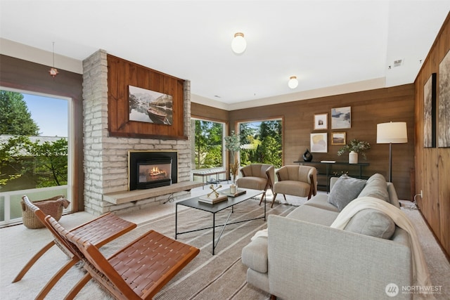 9376 Mercerwood Dr, Mercer Island, WA 98040 - living area with wooden walls and a brick fireplace