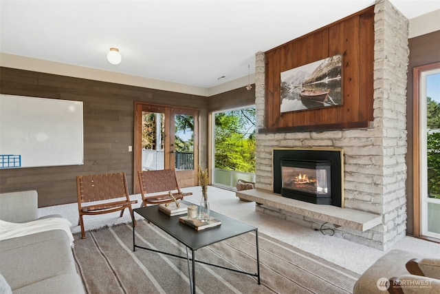 9376 Mercerwood Dr, Mercer Island, WA 98040 - living area with wood walls and a fireplace