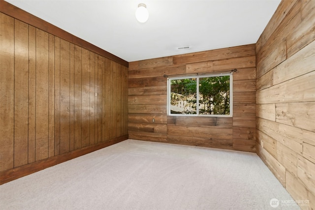 9376 Mercerwood Dr, Mercer Island, WA 98040 - carpeted spare room featuring visible vents and wooden walls