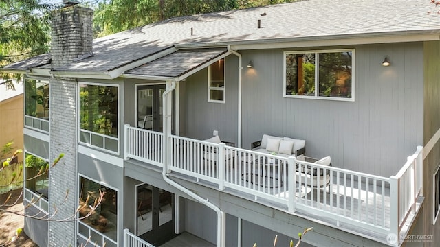 9376 Mercerwood Dr, Mercer Island, WA 98040 - rear view of house with roof with shingles and a chimney