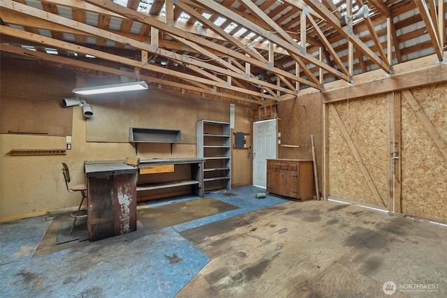garage with a workshop area
