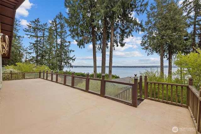 view of patio / terrace featuring a water view