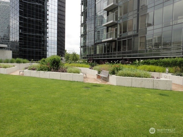 500 106th Ave NE Unit 1803, Bellevue, WA 98004 - view of home's community with a lawn