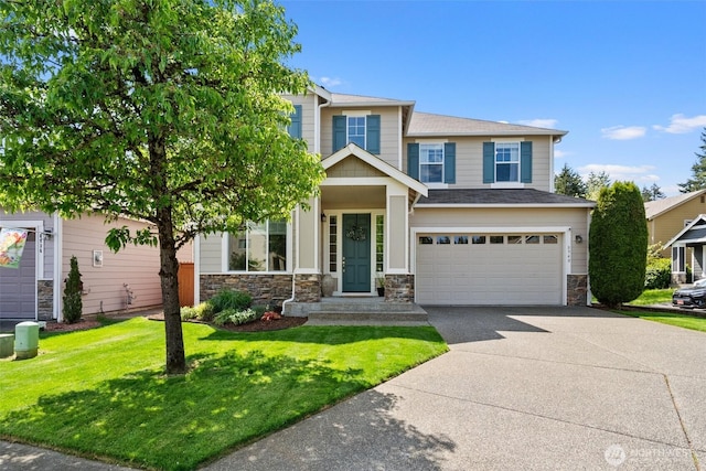 view of front of house featuring stone siding, concrete driveway, an attached garage, roof with shingles, and a front yard