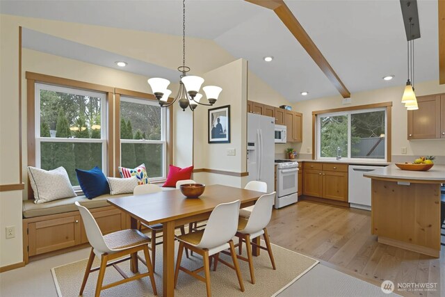 4019 Wexford Loop SE, Olympia, WA 98501 - dining area featuring a chandelier, vaulted ceiling, light wood-style floors, and recessed lighting