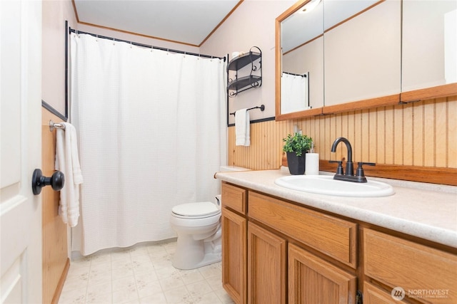 full bathroom with tile patterned floors, toilet, curtained shower, and vanity