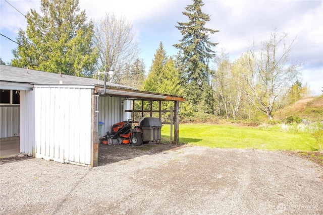 view of patio / terrace featuring a carport