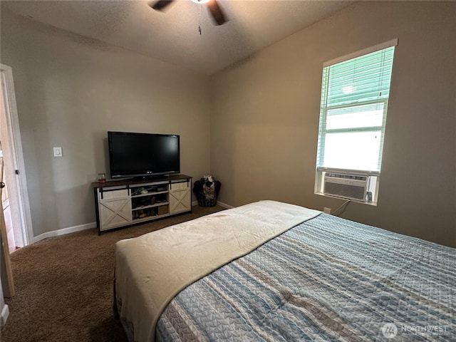 bedroom featuring cooling unit, carpet flooring, baseboards, and a ceiling fan