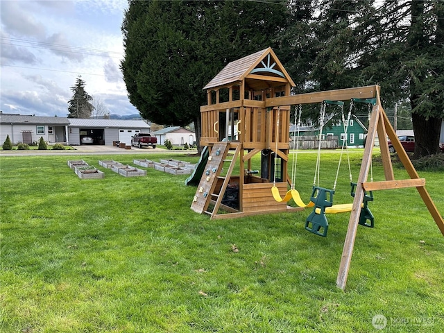 communal playground with a lawn