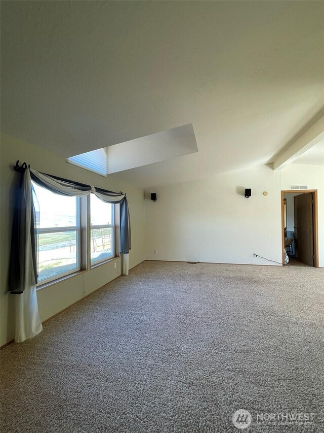 700 Pearl Hill Rd, Bridgeport, WA 98813 - carpeted spare room with vaulted ceiling with beams and visible vents