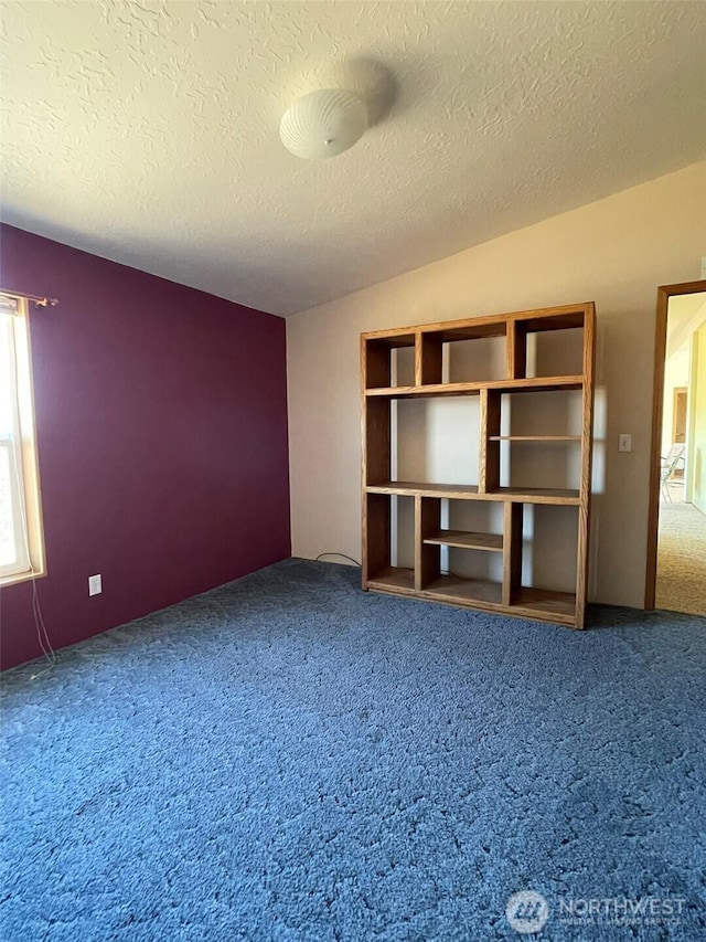 700 Pearl Hill Rd, Bridgeport, WA 98813 - carpeted empty room with a textured ceiling