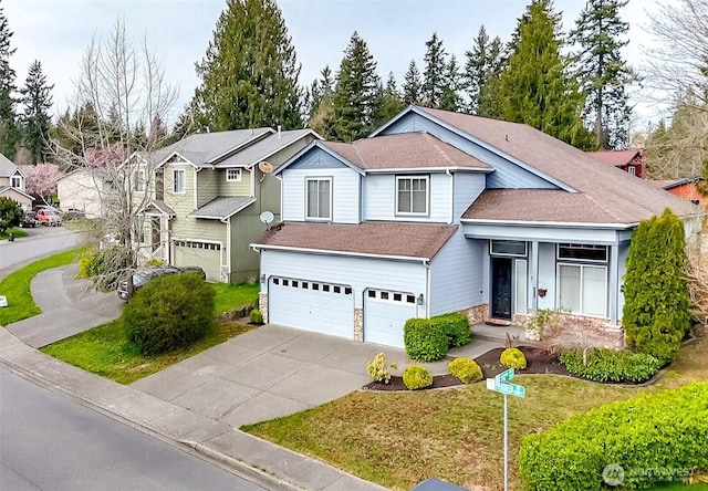 19204 Evergreen Dr, Bonney Lake, WA 98391 - traditional-style home with a shingled roof, stone siding, a garage, and driveway