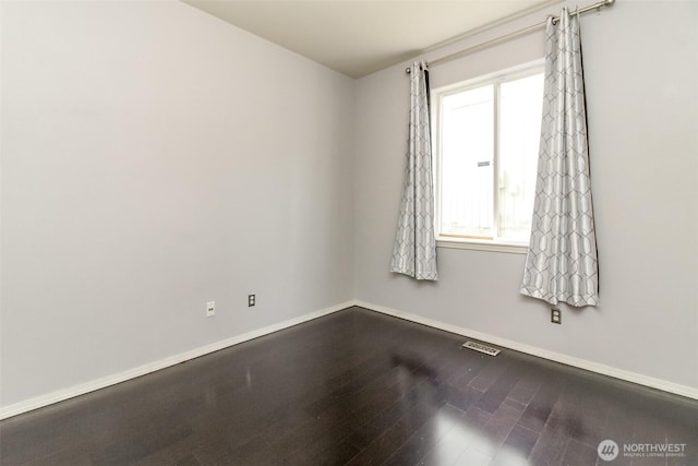 19204 Evergreen Dr, Bonney Lake, WA 98391 - empty room featuring wood finished floors, baseboards, and visible vents