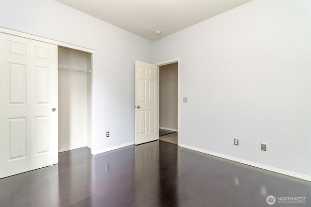 19204 Evergreen Dr, Bonney Lake, WA 98391 - unfurnished bedroom featuring wood finished floors, a closet, and baseboards