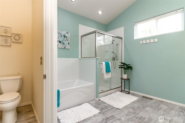 19204 Evergreen Dr, Bonney Lake, WA 98391 - full bathroom with baseboards, toilet, a shower stall, visible vents, and a garden tub