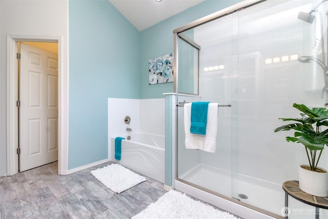 19204 Evergreen Dr, Bonney Lake, WA 98391 - full bath with a bath, a stall shower, wood finished floors, and baseboards