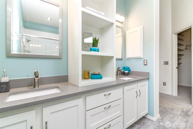 19204 Evergreen Dr, Bonney Lake, WA 98391 - full bath with a shower with shower door, double vanity, and a sink