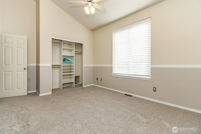 19204 Evergreen Dr, Bonney Lake, WA 98391 - unfurnished bedroom with a closet, baseboards, visible vents, carpet floors, and lofted ceiling