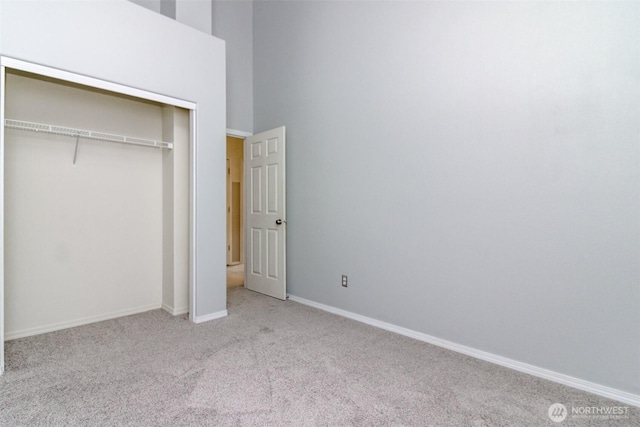 19204 Evergreen Dr, Bonney Lake, WA 98391 - unfurnished bedroom featuring a closet, baseboards, and carpet floors