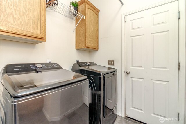 19204 Evergreen Dr, Bonney Lake, WA 98391 - laundry room with washer and dryer and cabinet space