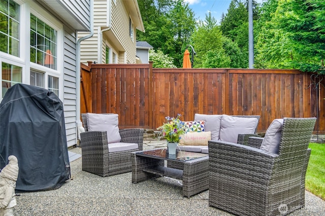 view of patio / terrace featuring a fenced backyard and an outdoor hangout area