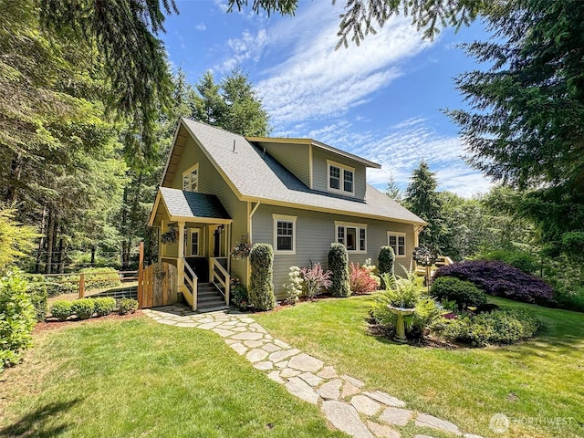 325 Evergreen View Pkwy, Port Angeles, WA 98363 - bungalow-style house with a front lawn, a shingled roof, and fence