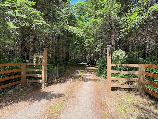 325 Evergreen View Pkwy, Port Angeles, WA 98363 - view of street with a view of trees and a gate