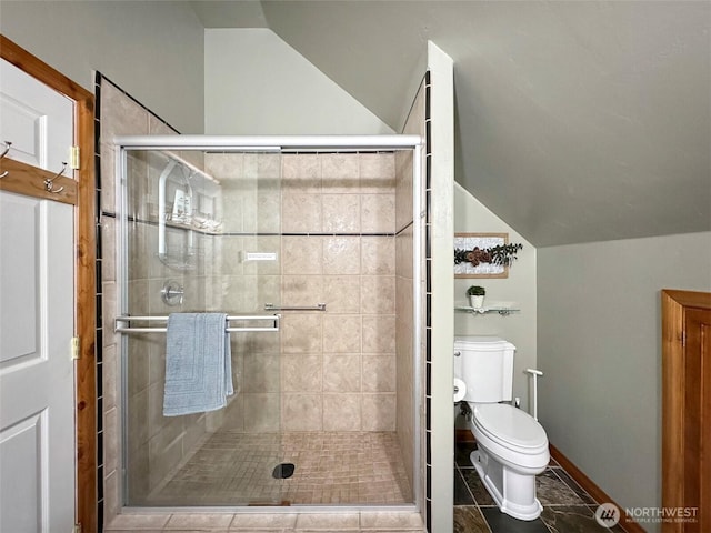 325 Evergreen View Pkwy, Port Angeles, WA 98363 - bathroom with tile patterned floors, toilet, a stall shower, and lofted ceiling