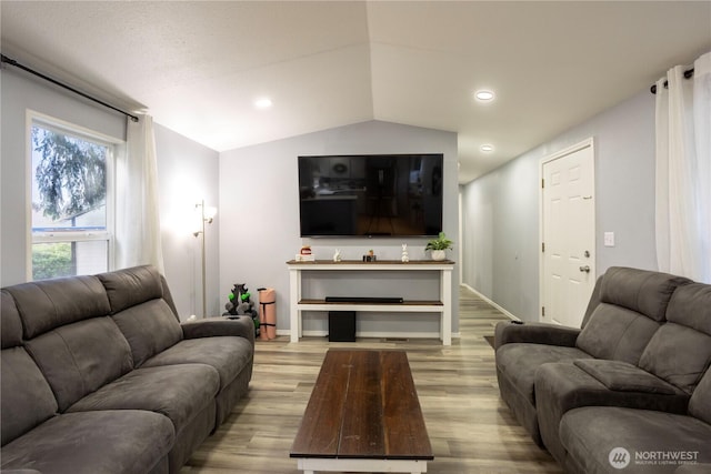 3001 S 288th St Unit 282, Federal Way, WA 98003 - living area with light wood-style flooring, recessed lighting, vaulted ceiling, and baseboards