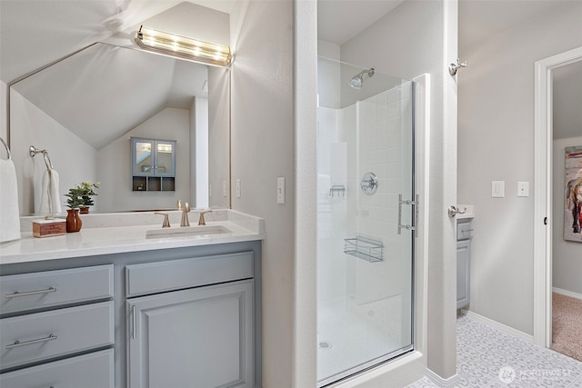 1716 7th St SE, Puyallup, WA 98372 - bathroom featuring a shower stall, vanity, and lofted ceiling