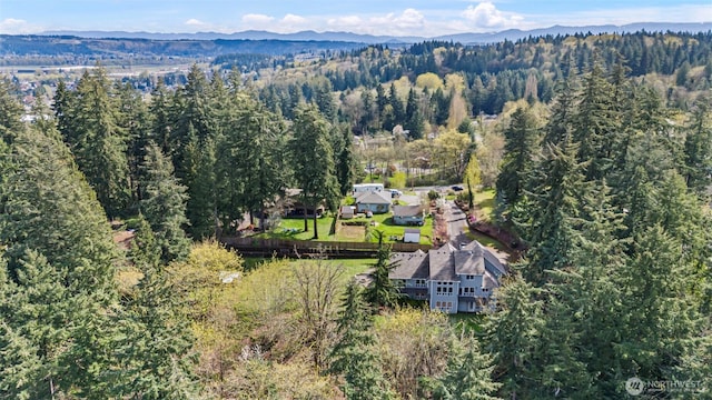 1716 7th St SE, Puyallup, WA 98372 - birds eye view of property with a wooded view and a mountain view