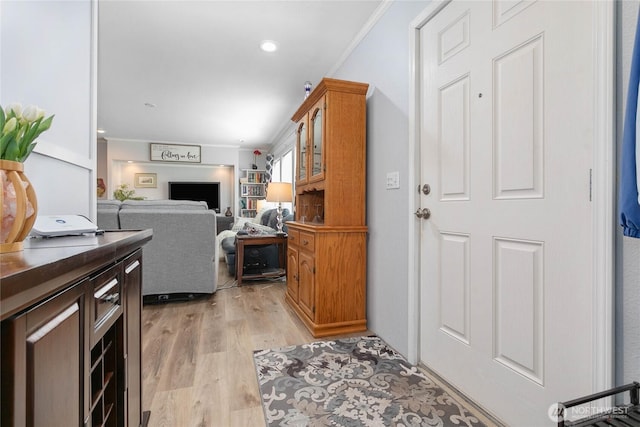 foyer with light wood finished floors