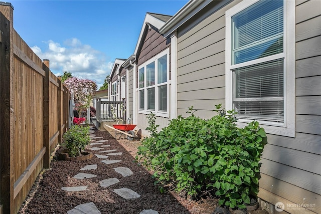 view of home's exterior with a fenced backyard