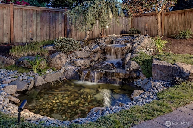 5829 112th Pl NE, Kirkland, WA 98033 - view of yard featuring a small pond and fence