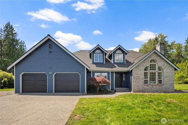 12425 318th Ave NE, Duvall, WA 98019 - view of front of property featuring a garage, concrete driveway, a front lawn, a chimney, and brick siding